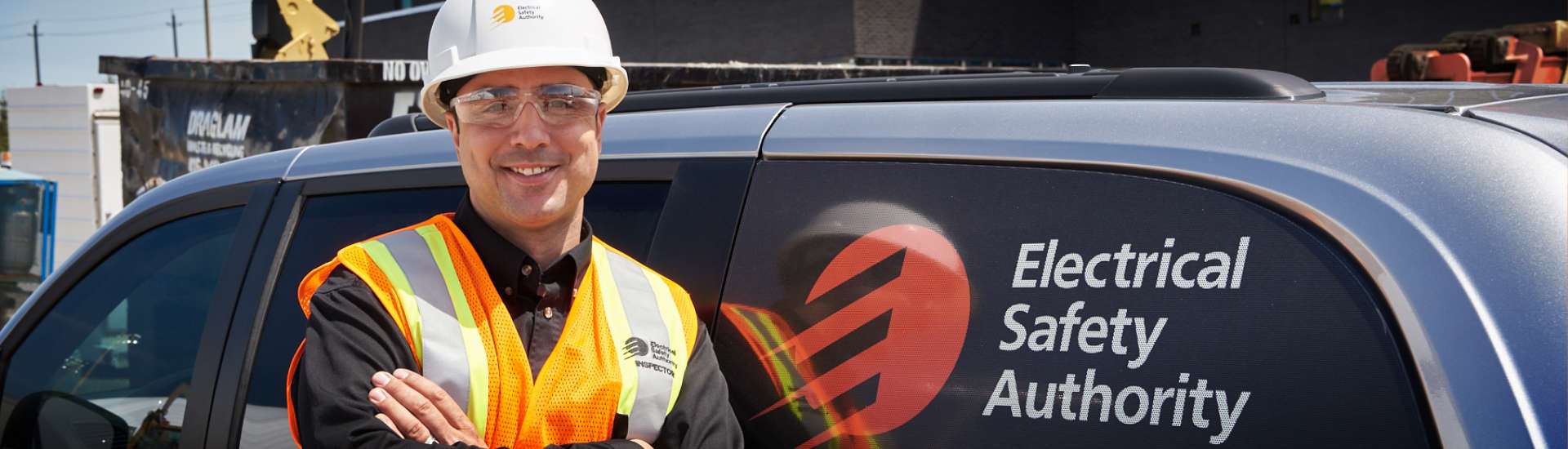 man smiling next to ESA vehicle