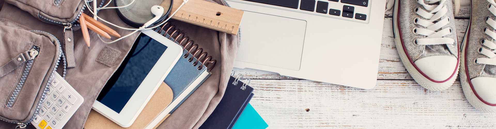 laptop, back with school books
